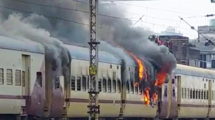 RRB-NTPC Result: Students' ruckus on third day, train coach set on fire