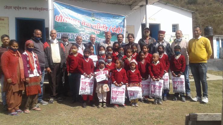Dhauladhar service distributed the text material to the students in Dhared school