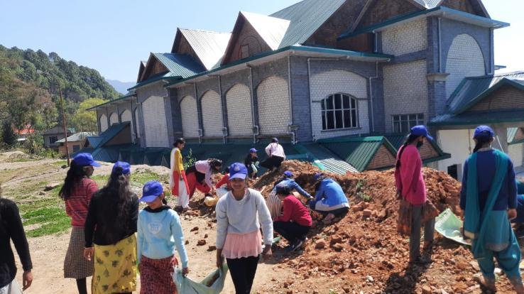 On the fifth day, volunteers cleaned up around the teacher colony