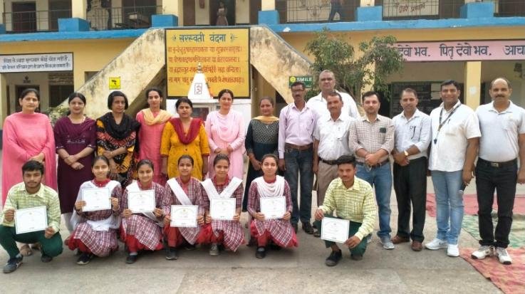  Distribute certificates to meritorious students