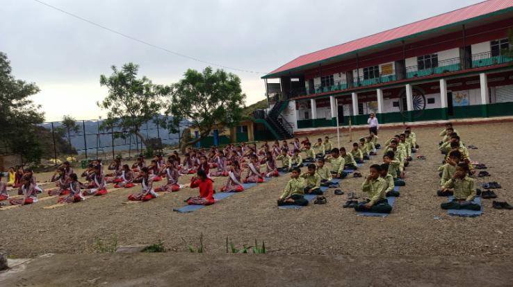 Teachers and students did Surya Namaskar on World Yoga Day