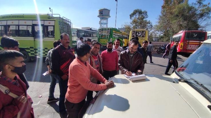 Bound two private buses carrying passengers without permit and without paying tax-RTO