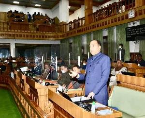 Challenge: Debt burden on shoulders and key to empty treasure in hand