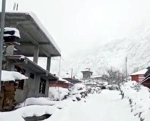 Intermittent snowfall continues in high altitude areas
