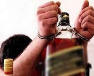Seven bottles of country liquor caught from a person in a jiffy