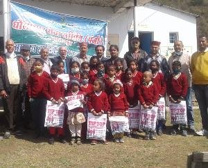 Dhauladhar service distributed the text material to the students in Dhared school