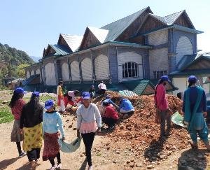 On the fifth day, volunteers cleaned up around the teacher colony