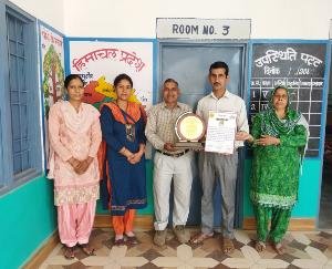Institute of Education and Training honored the SMC of Navgaon School