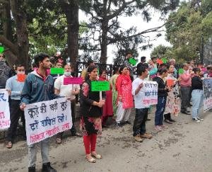 People protested outside the Deputy Commissioner's office regarding huge water bills