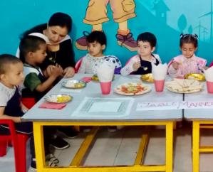 Teach children table manners at Genius Global School