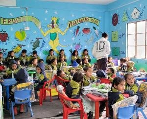 School dress, blazer and track suit distributed to school children