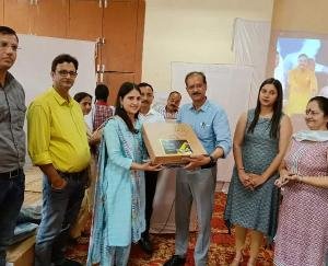 Distributed laptops to meritorious students: Ravindra Dhiman