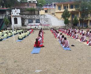 Teachers and students did Surya Namaskar on World Yoga Day