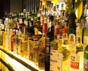 Police recovered 6 bottles of country liquor from shopkeeper, case registered