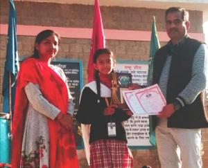 Swastika, a student of Ghumarwin School Shaheed Vijay Pal, won a gold medal in yoga