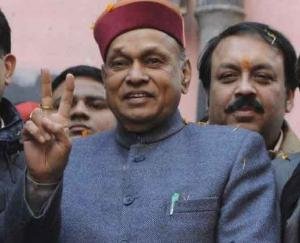 Dhumal is also a professor of politics