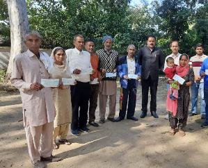 MLA Malendra Rajan distributed checks worth Rs 6.70 lakh to 14 eligible people.