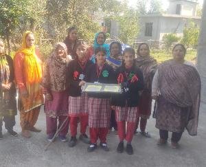  Girls students are teaching the method of making paper from the leaves of Tulsi plant.