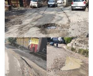 Jaisinghpur: Potholes in the road are inviting accidents in Lambagaon.