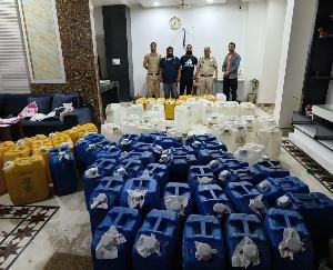 Person arrested with 82 cans of spirit and Rs 9,09,450 in cash