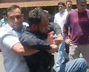 The -blind- association- blocked- the- road -outside -the -society, -the -police -removed- the -protesters