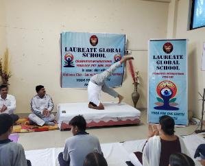 International Yoga Day celebrated at Laureate Global School, Dole by Wellness Club of Laureate Institute of Pharmacy, Kathug