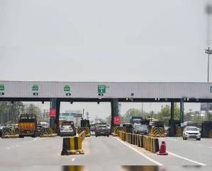 Toll collected on HRTC bus despite not passing through a toll plaza; passengers raise questions.