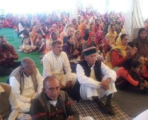 Listeners enjoy the story of the fourth day at the Durga Mata temple